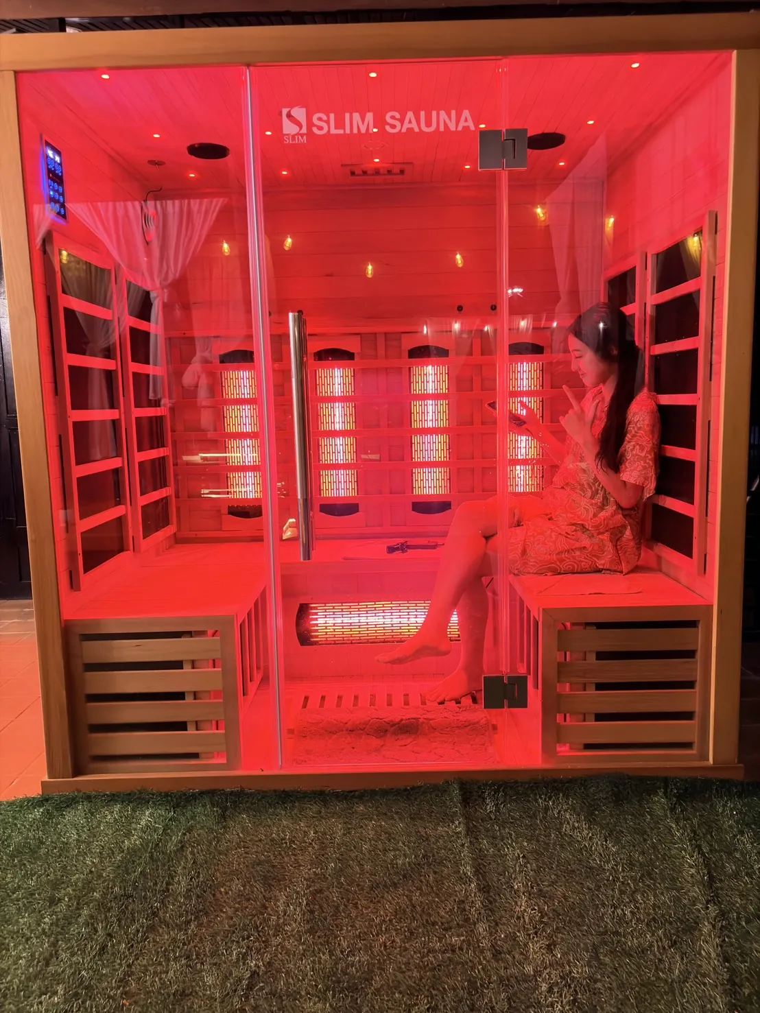 Modern infrared sauna cabin with red therapeutic light at Dewata Pattaya
